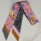 Hermès Guepards Bandana Twilly Single in rose, gris and bleu silk, folded