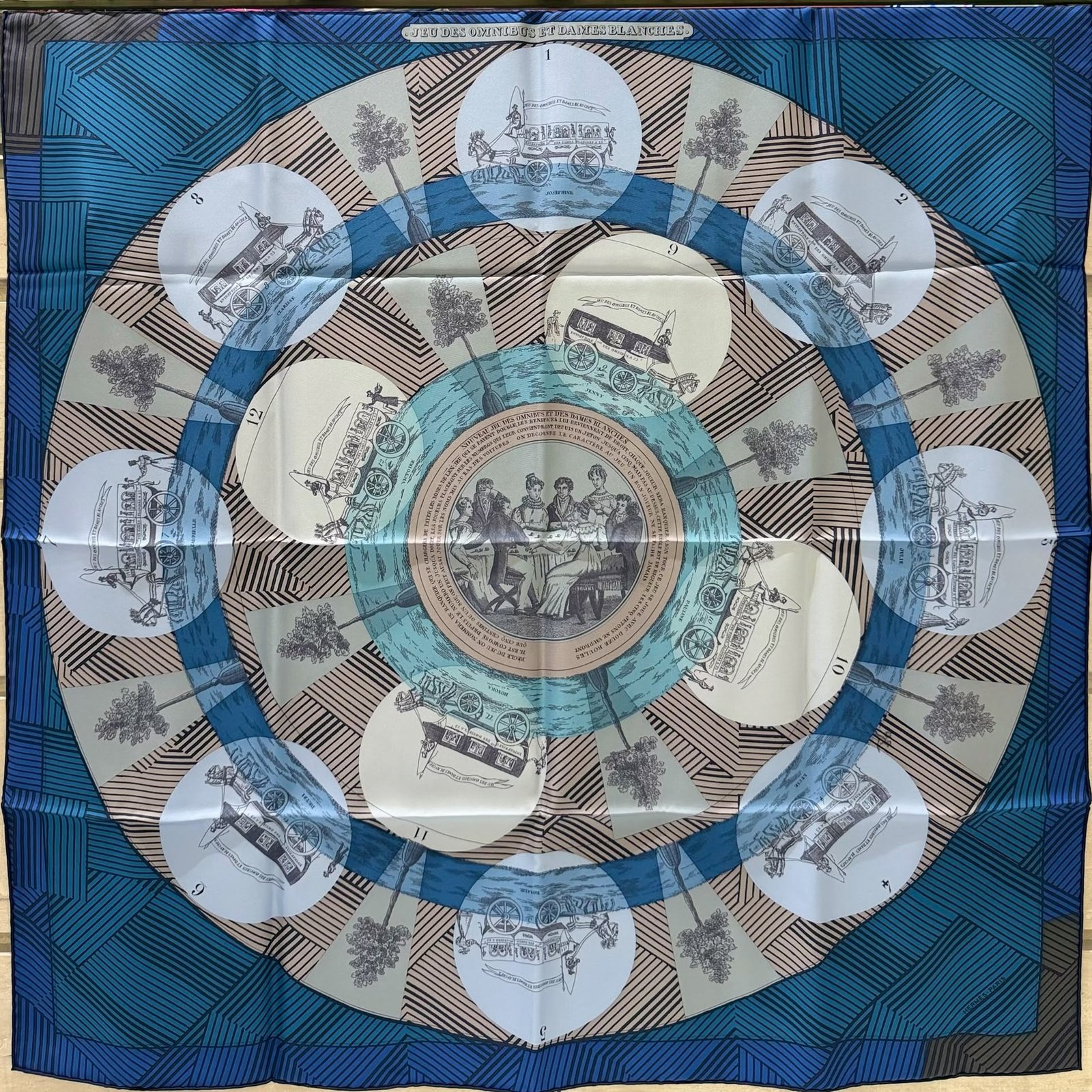 hermes-jeu-des-omnibus-remix-scarf-90-1 Hermès Jeu des Omnibus Remix silk scarf 90 in blue multicolour, laid flat