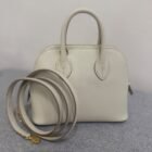 Hermès Mini Bolide in Beton Evercolor leather with gold hardware and shoulder strap