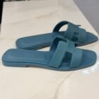 Hermès Oran sandals in Bleu Mineral Epsom leather, side view