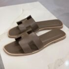 Hermès Oran sandals in Etoupe Swift leather, side view