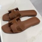 Hermès Oran sandals in Gold Swift leather, side view
