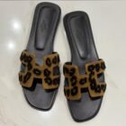 Hermès Oran sandals in leopard with black footbed, size 39, from above
