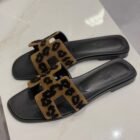 Hermès Oran sandals in leopard, side view