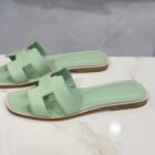 Hermès Oran sandals in Vert Jade Epsom leather, side view