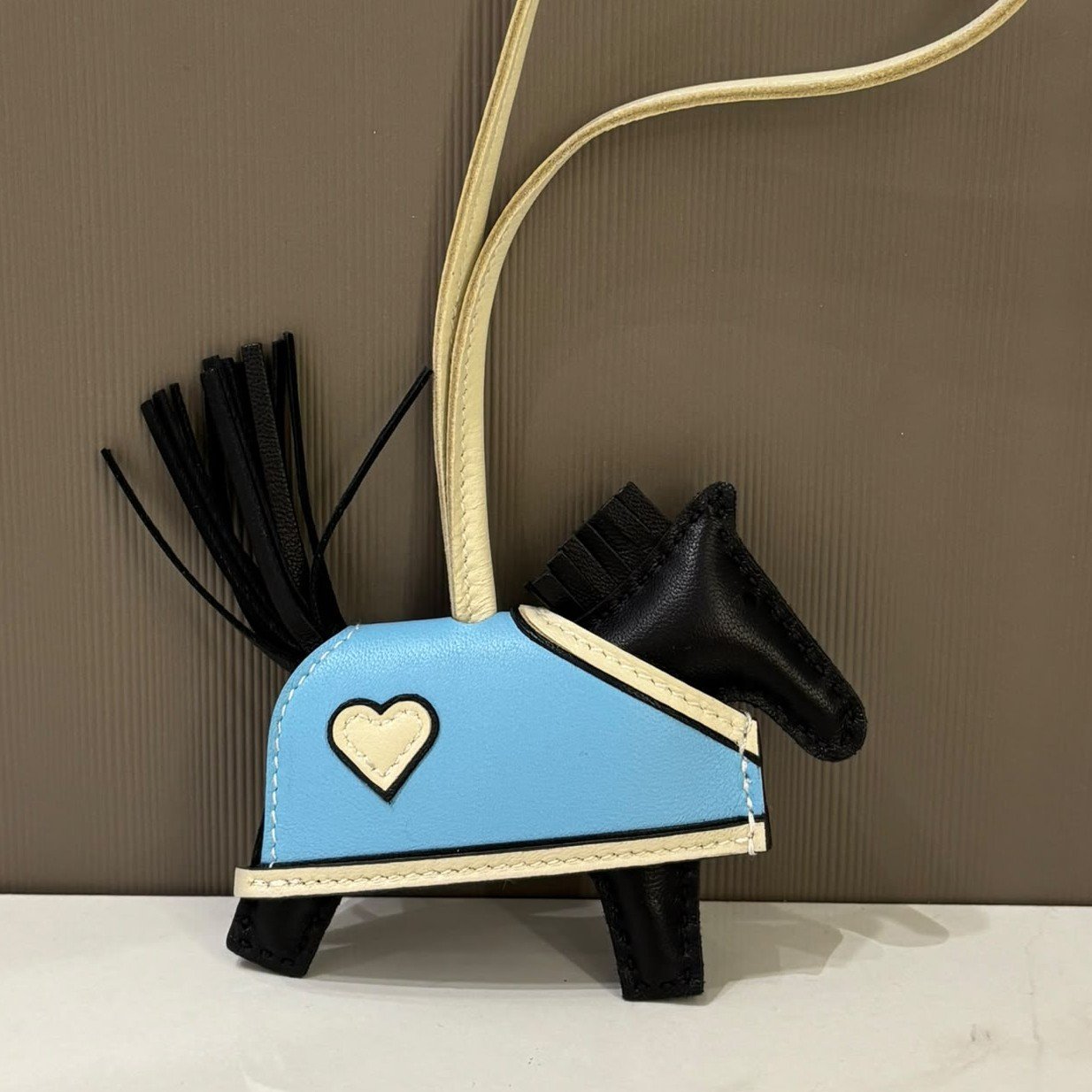 hermes-rodeo-robeo-charm-pm-noir-celeste-photo Hermès Rodeo Robeo Charm PM, Noir / Celeste / Craie